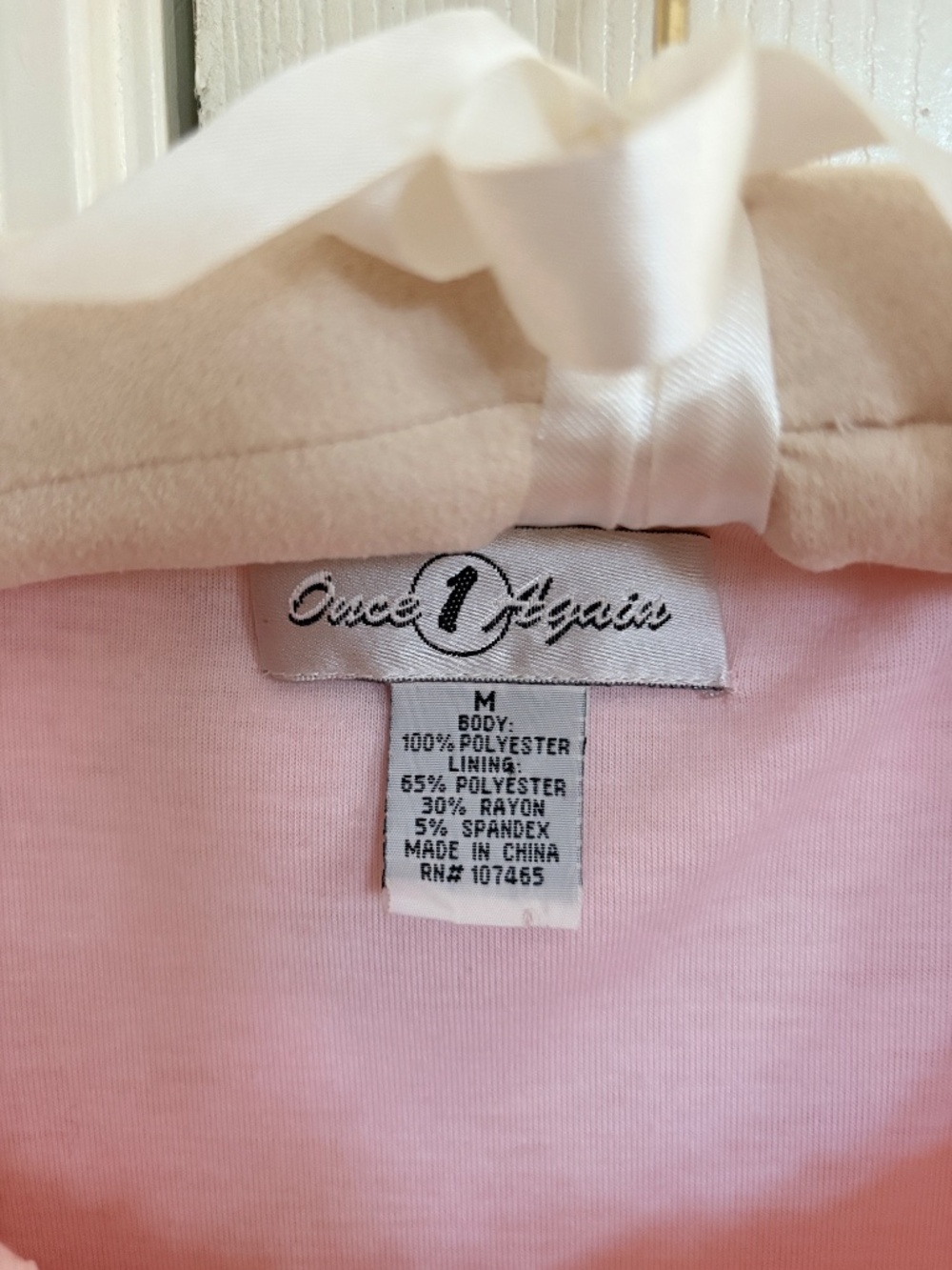 A pink 3D rosette textured short-sleeve top. - Picture 3 of 4